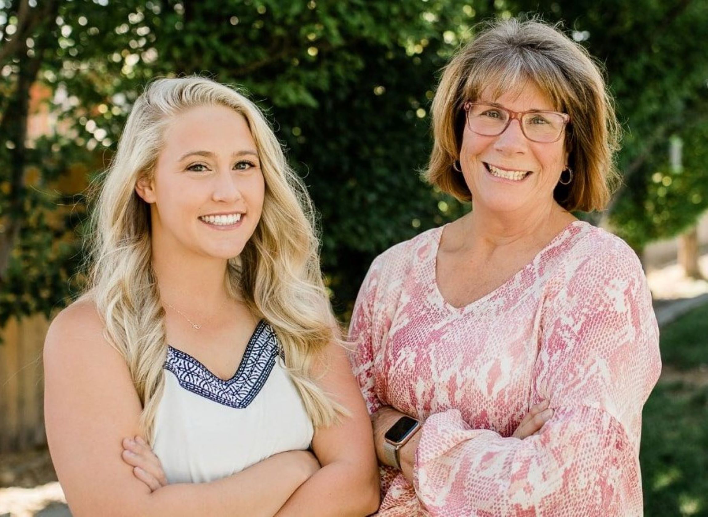 real estate professionals Val and daughter standing together