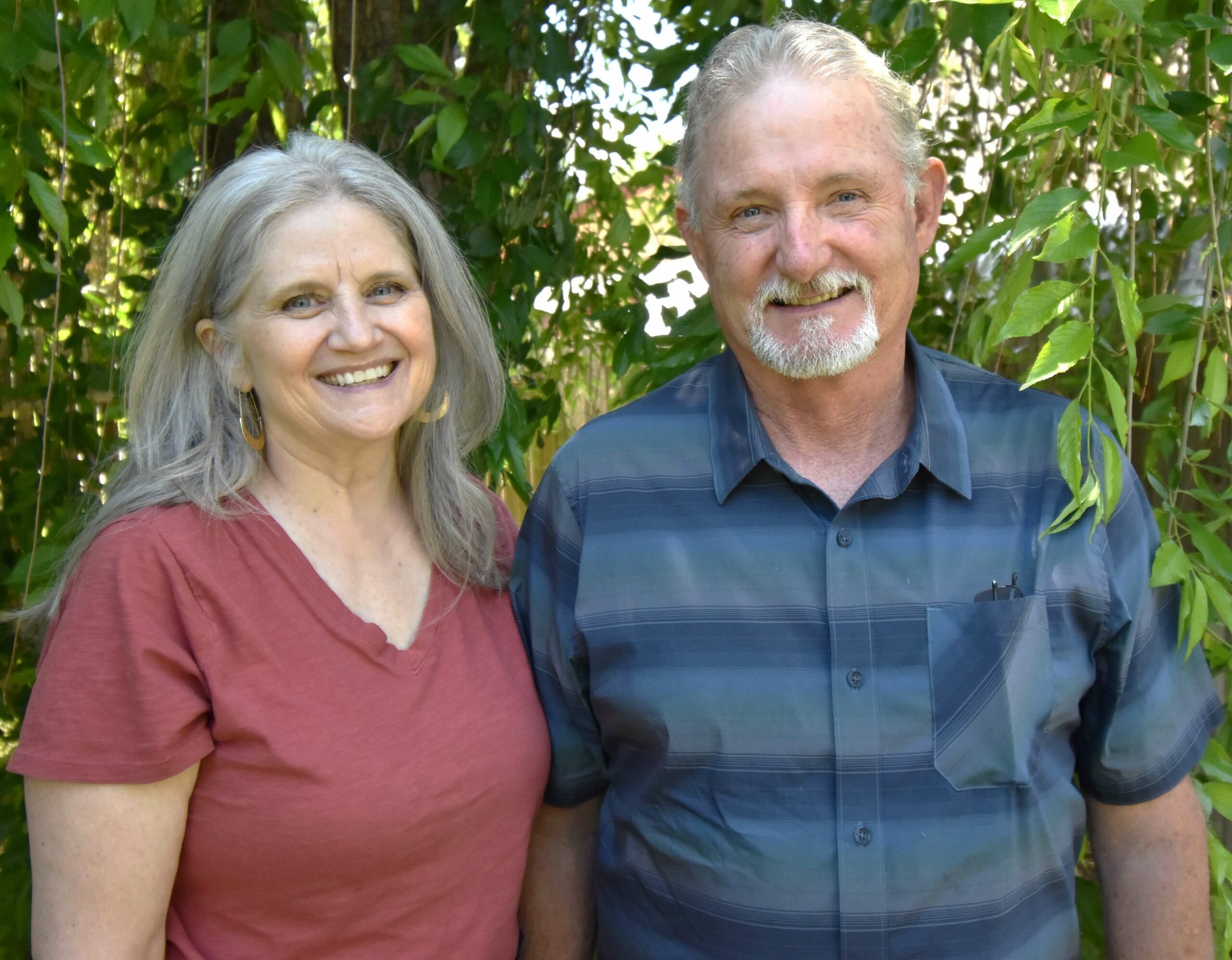 Kathryn and Mike, husband standing together